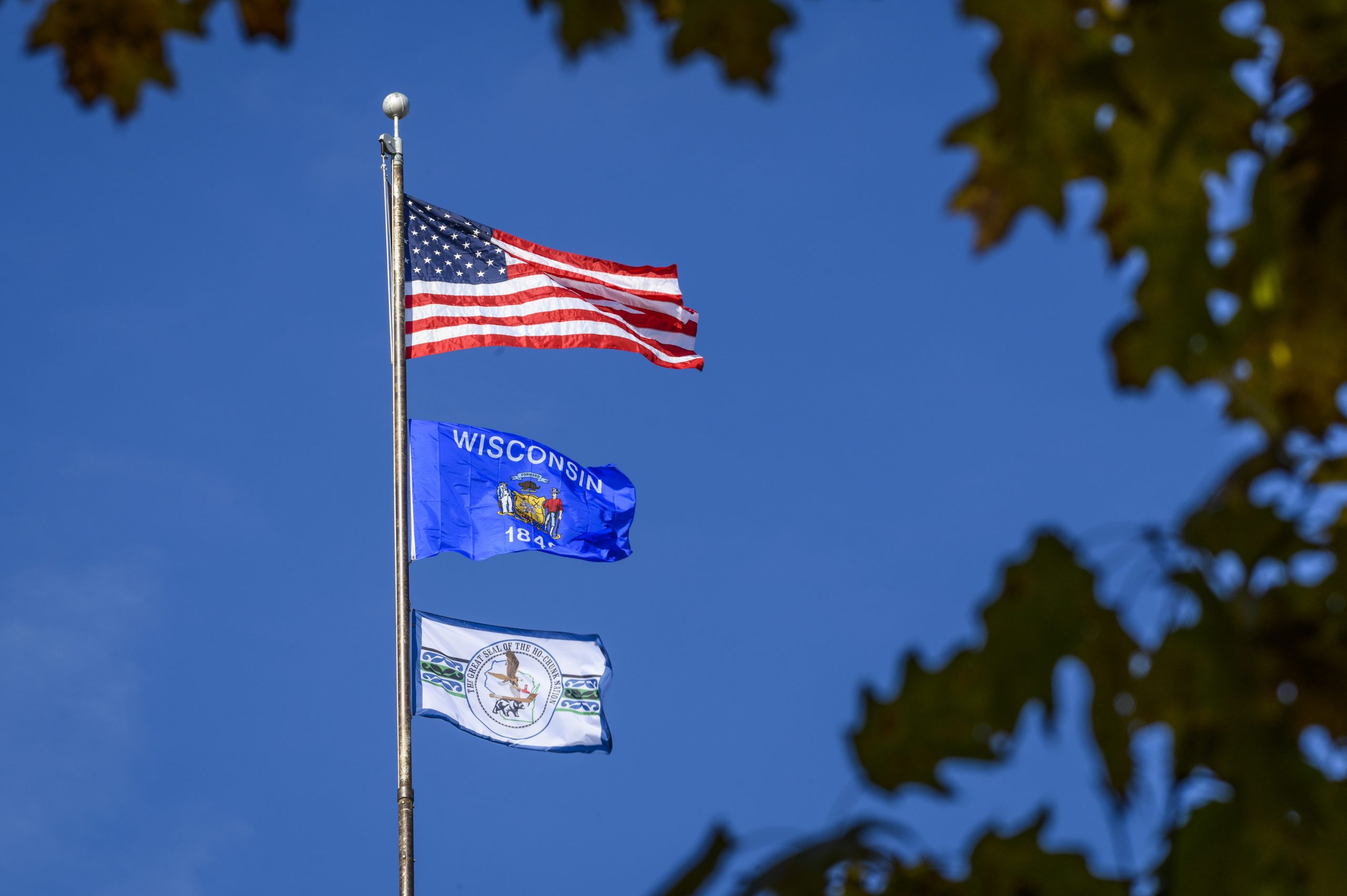 Flag post with the flag of Wisconsin