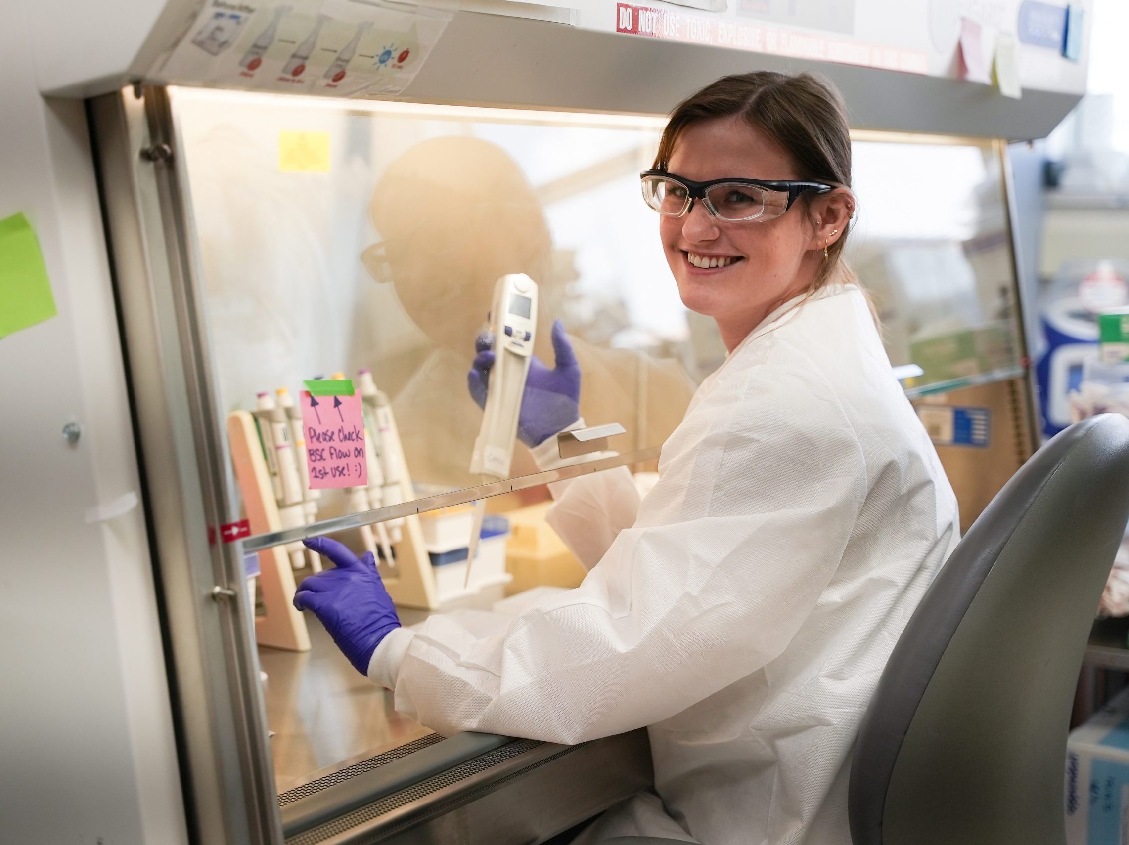 Laboratory Analyst working in the lab-Link to In the News