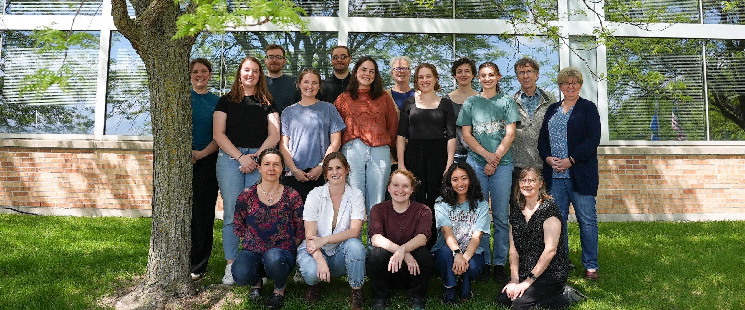 Wastewater Monitoring Team laboratory staff gathered for a group photo outside of the Wisconsin State Laboratory of Hygiene in Madison, WI.